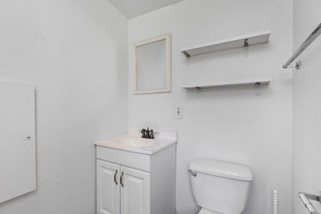 Bathroom with vanity and toilet | Image 35