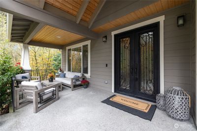 Let's start at the covered porch- with plenty of space to relax and enjoy watching the neighborhood. | Image 2