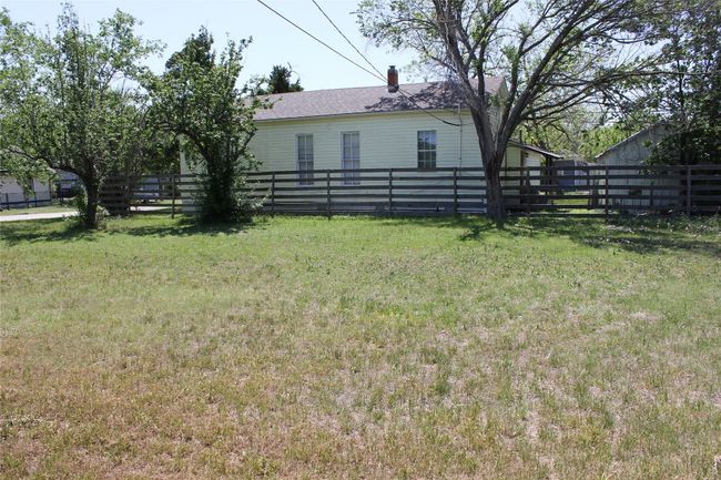 View of yard featuring fence | Image 28