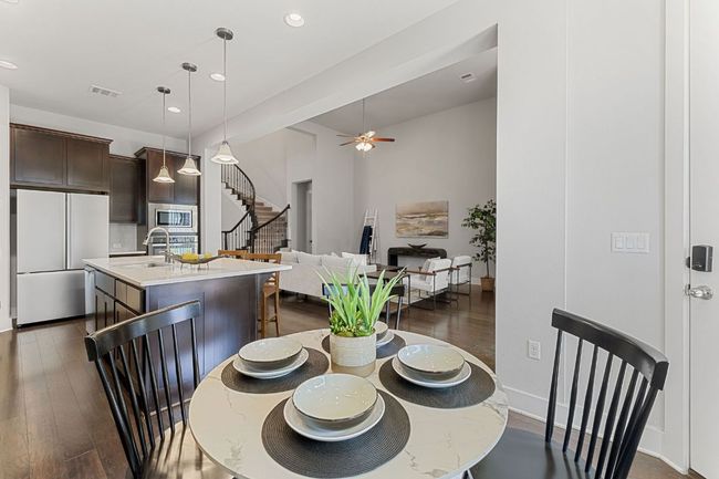 Breakfast room open to the kitchen. | Image 14