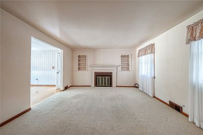 living room with fireplace | Image 3