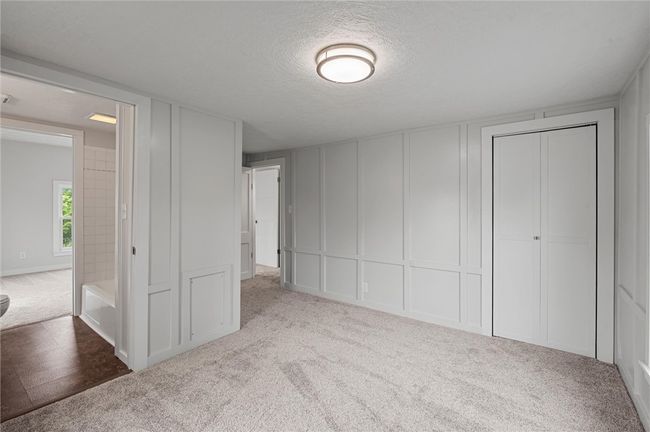 Upstairs offers 2 bedrooms with a jack n Jill bathroom. | Image 15