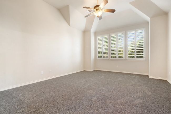 The primary suite is located just off the family room. | Image 23