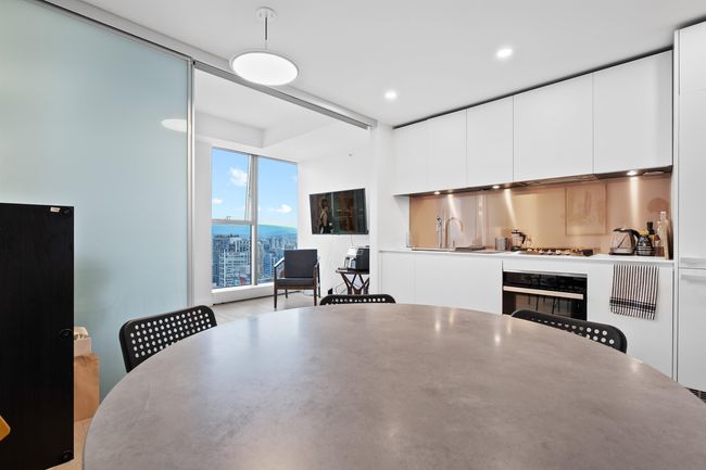 Dining room featuring bar and recessed lighting | Image 12