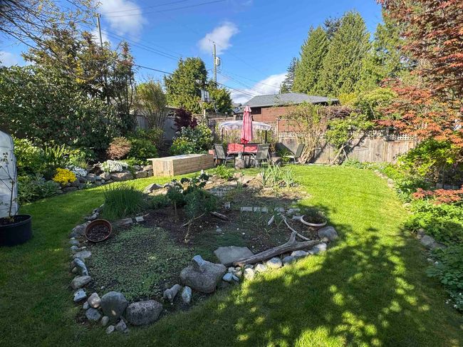 View of yard featuring fence | Image 8