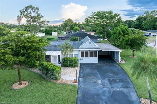 402 E Cleveland Ln, LEHIGH ACRES, FL, 33936-6630 | Card Image