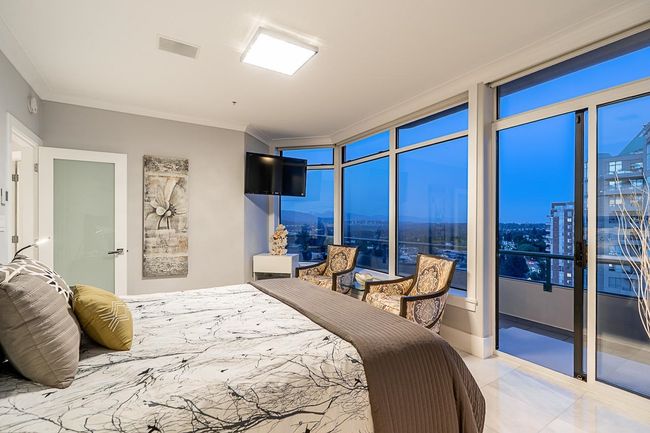 Bedroom featuring crown molding | Image 26