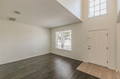 Soaring foyer featuring hardwood / wood-style floors | Image 3