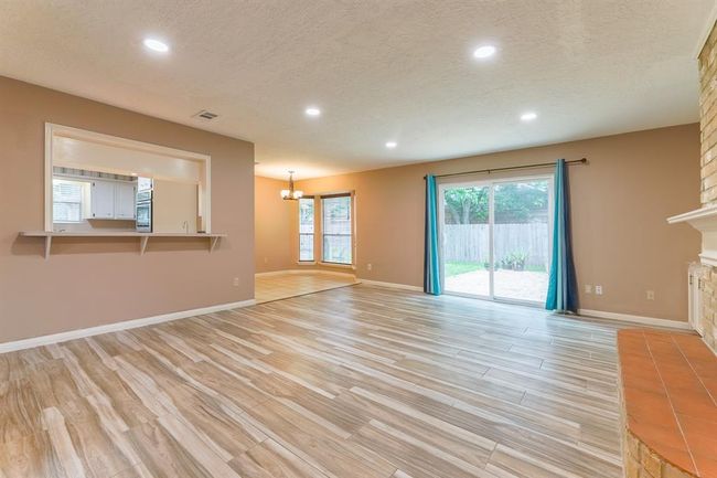 Kitchen is open to the living area | Image 7