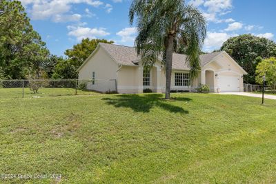 211 Deauville Avenue Se, House other with 4 bedrooms, 2 bathrooms and null parking in Palm Bay FL | Image 3