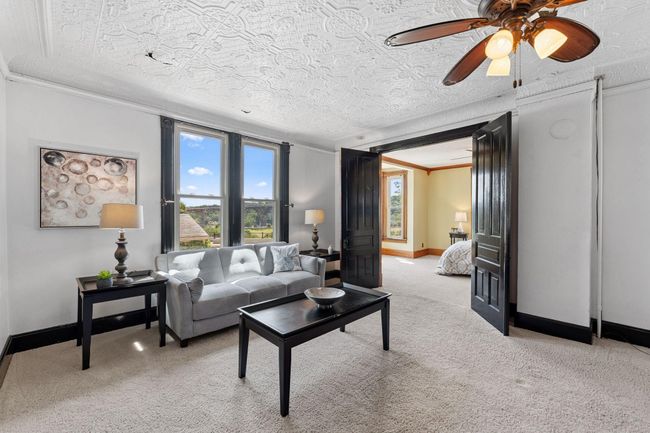 Main level living room with views of the Mississippi River | Image 4
