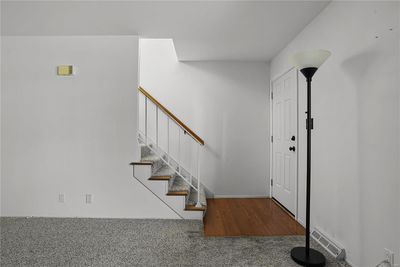 View of carpeted entryway | Image 2