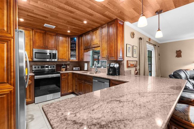 7489 Gates Cir, House other with 3 bedrooms, 2 bathrooms and null parking in SPRING HILL FL | Image 12
