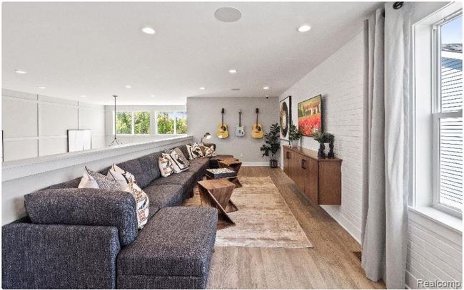 Generous loft provides a splendid view of the great room below | Image 9