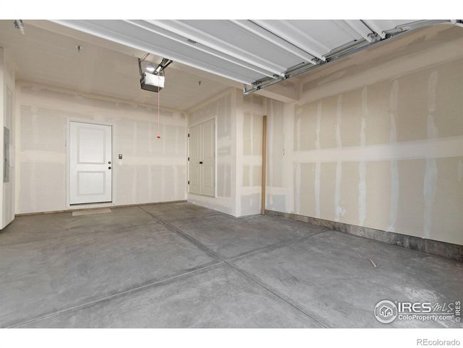 Attached garage has plenty of room for golf cart parking! | Image 19