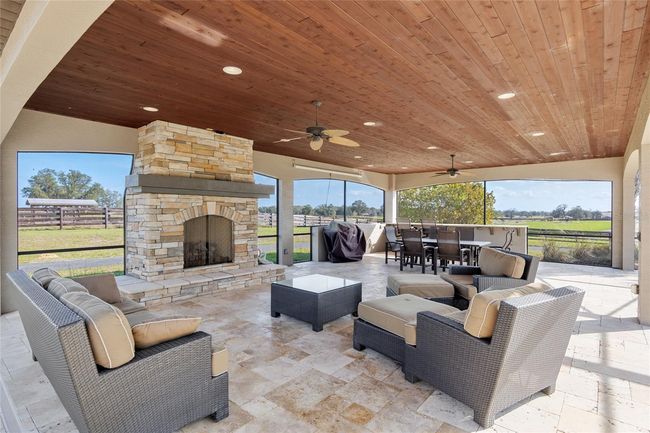 Outdoor fireplace and seating area -- just imagine unwinding after a day on the farm!! | Image 64