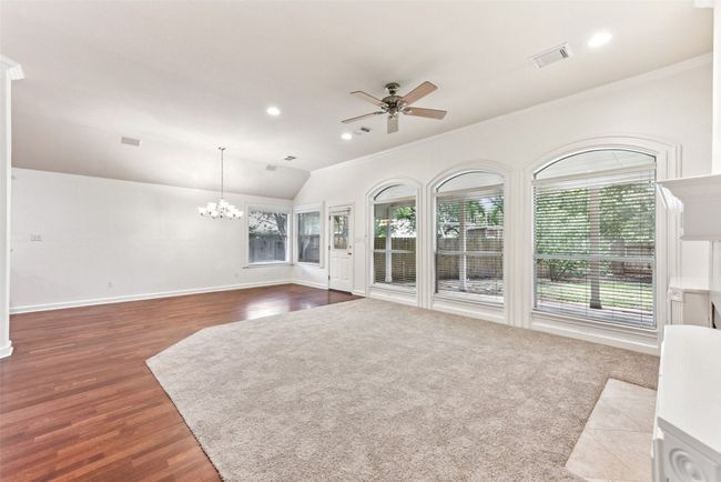 View of family room with beautiful windows and dining space | Image 24