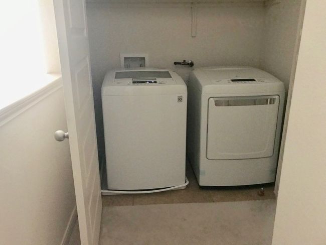 Laundry room with washer and dryer | Image 13