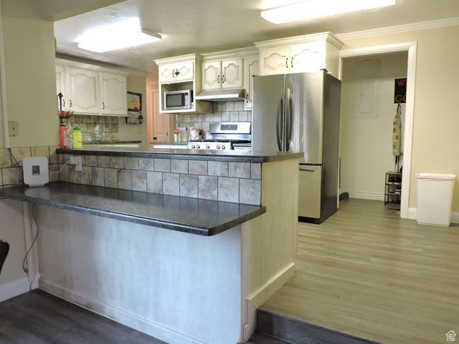 Kitchen Open to Dining & Great Room | Image 13