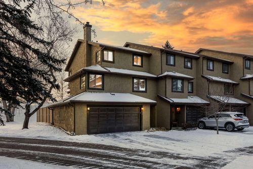 58 Glamis Gardens Sw, Home with 2 bedrooms, 2 bathrooms and 4 parking in Calgary AB | Card Image