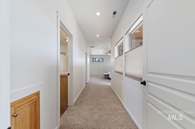Corridor featuring light colored carpet and recessed lighting | Image 26