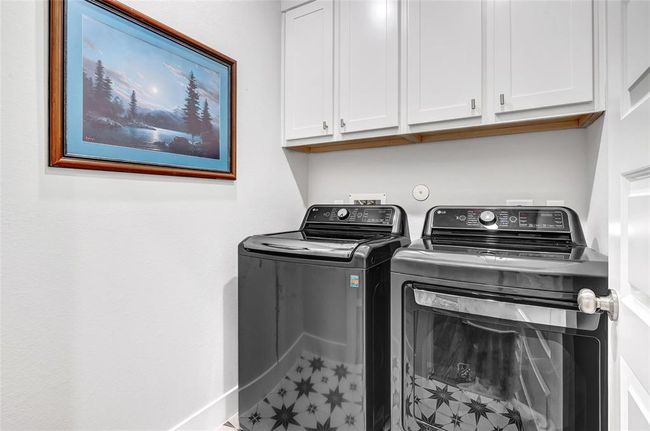 Cabinets for additional storage in Utility Room. | Image 15