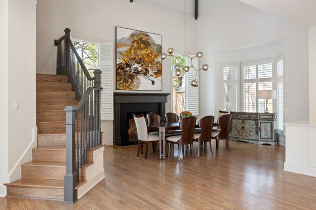 Breakfast nook by rear staircase, open to the kitchen | Image 9