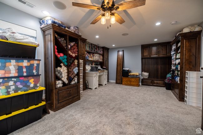 Bedroom with light colored carpet, recessed lighting, and ceiling fan | Image 35