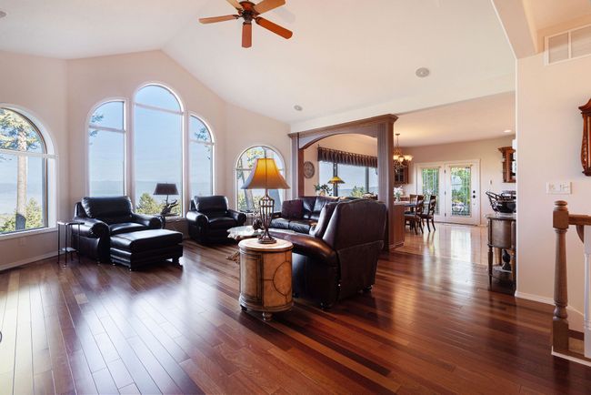 Main level living area looking into dining area | Image 9