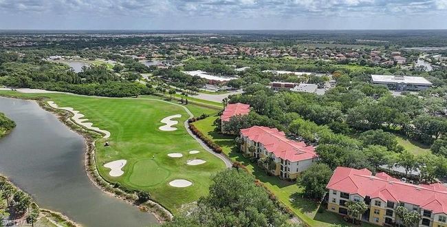 Aerial view featuring a water view and view of golf course | Image 20