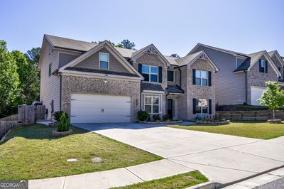 3117 Cove View Court, House other with 5 bedrooms, 3 bathrooms and 6 parking in Dacula GA | Image 3