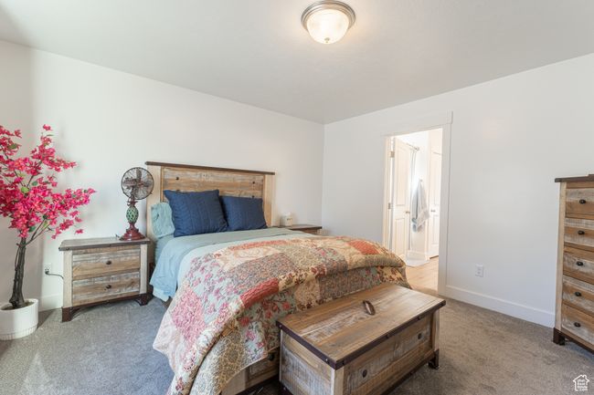 Bedroom with baseboards and carpet flooring | Image 9