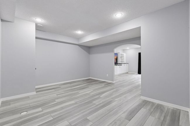 Large lower level features game room, walkout basement and flex space | Image 22