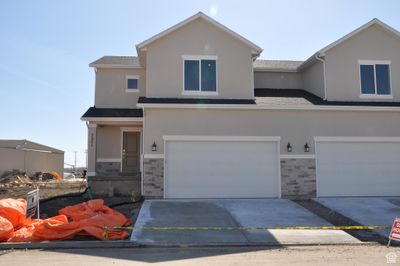 View of front property with a garage | Image 1