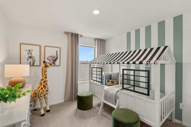 Photo of Pulte model home with same floor plan, not of actual home listed. | Image 11