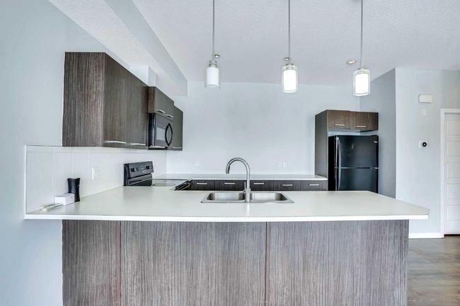 201 - 70 Saddlestone Dr Ne, Townhouse with 2 bedrooms, 3 bathrooms and 1 parking in Calgary AB | Image 33