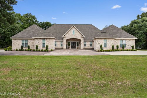 7411 Woodland Dr, Pass Christian, MS, 39571-4451 | Card Image