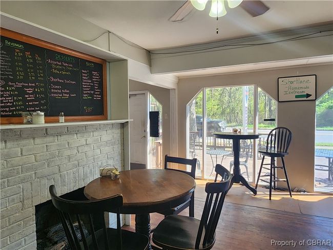 Main entrance with fireplace. Original Fireplace AS IS condition | Image 9