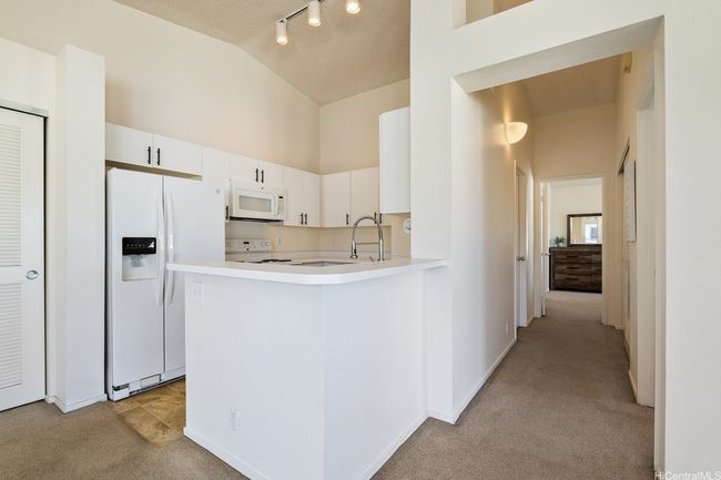 Bedrooms are separate from the main living area, providing privacy and peace of mind. | Image 15