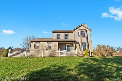 10495 Gordon Road, Home with 3 bedrooms, 2 bathrooms and null parking in Tyrone Twp MI | Image 1