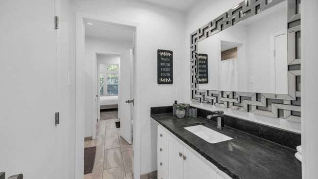 Full bath featuring vanity and ensuite bath | Image 28