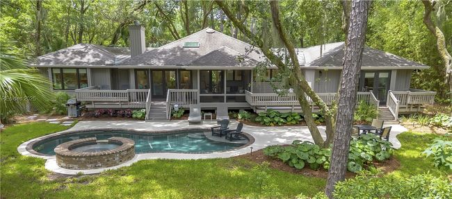 Backyard with PebbleTec, saltwater pool & spa | Image 4