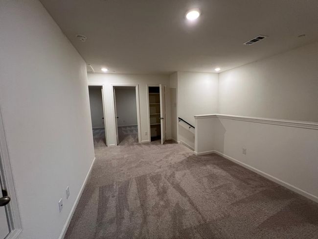 Basement with carpet flooring, baseboards, and recessed lighting | Image 20