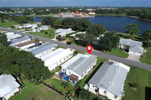 392 Egret Cir, Barefoot Bay, FL, 32976-7813 | Card Image