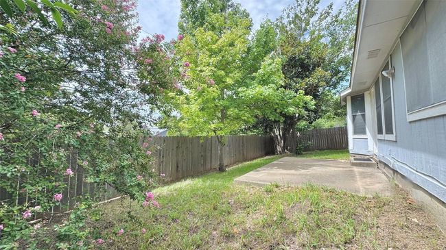 Fenced backyard featuring a patio area | Image 17