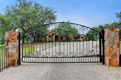 Private gated entrance to the fully fenced property. | Image 3