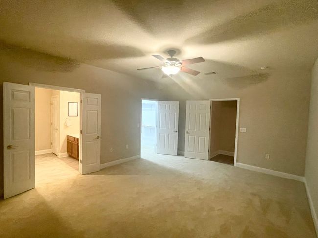 Huge primary bedroom with large walk-in closet | Image 8