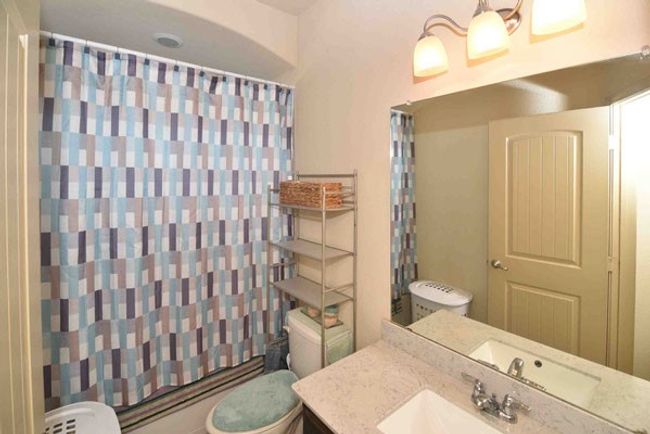 Bathroom featuring toilet and vanity | Image 26