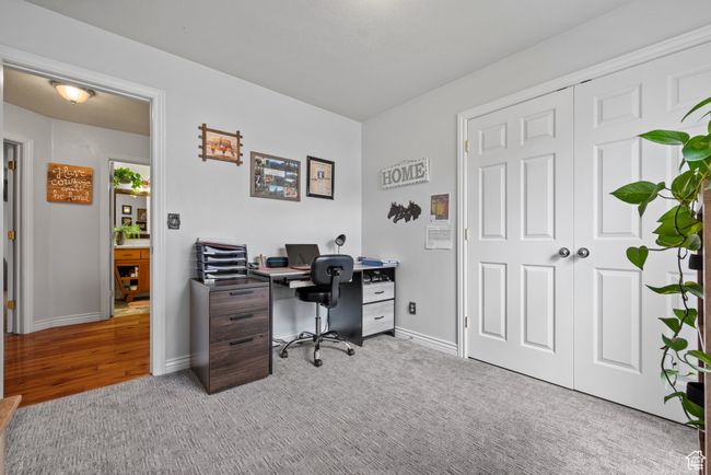 Home office featuring carpet and baseboards | Image 17