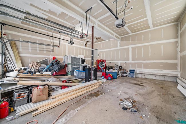 Garage with a garage door opener | Image 41